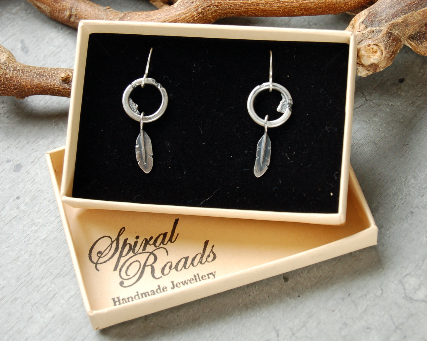 Silver feather earrings. Rustic Boho style