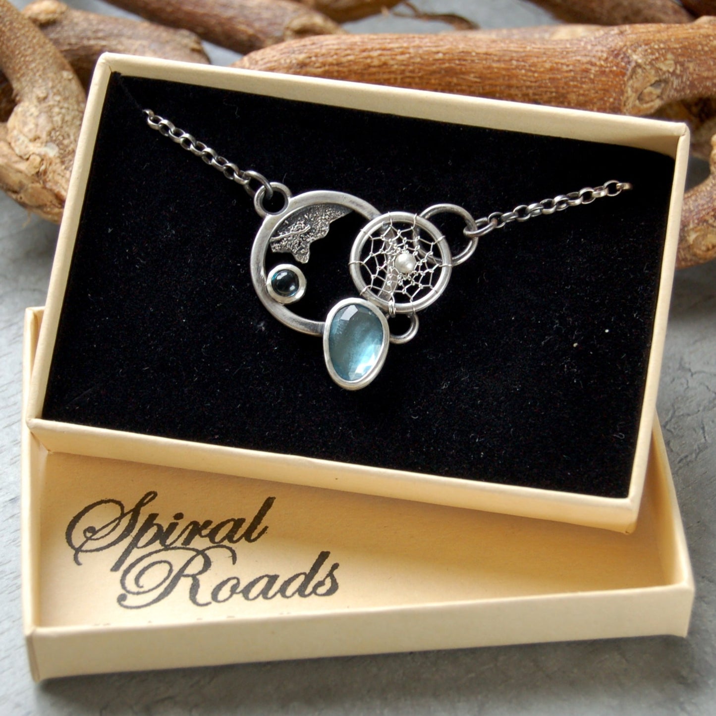 London Blue topaz gemstone necklace. Boho chic dreamcatcher pendant
