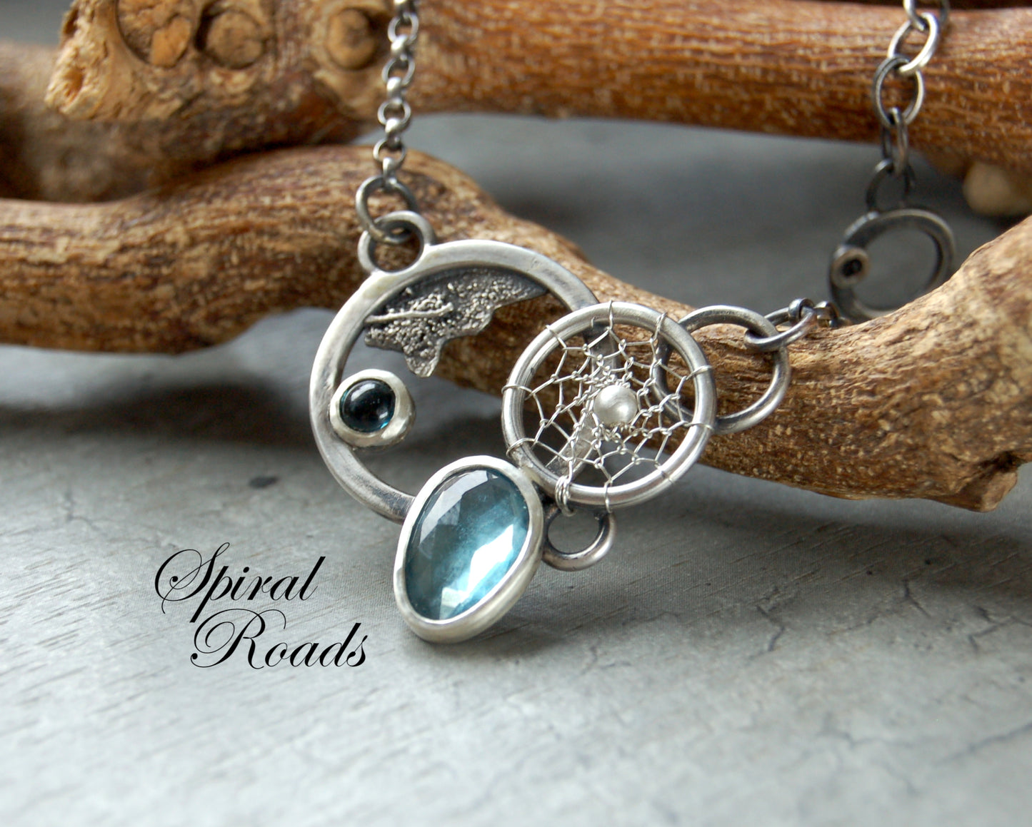 London Blue topaz gemstone necklace. Boho chic dreamcatcher pendant