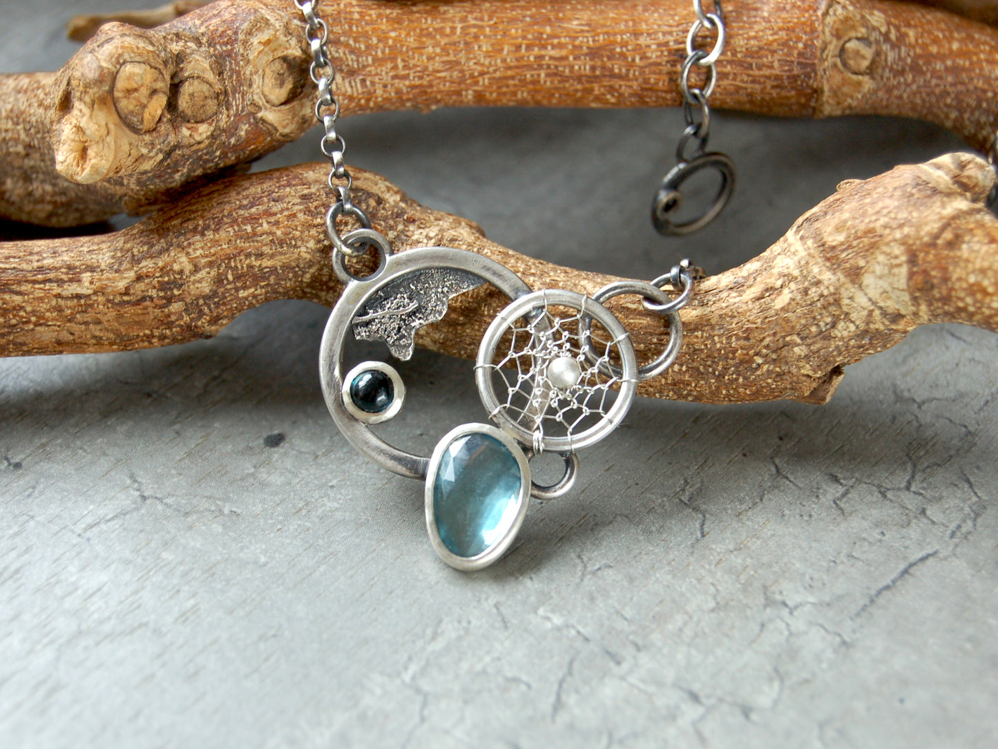 London Blue topaz gemstone necklace. Boho chic dreamcatcher pendant