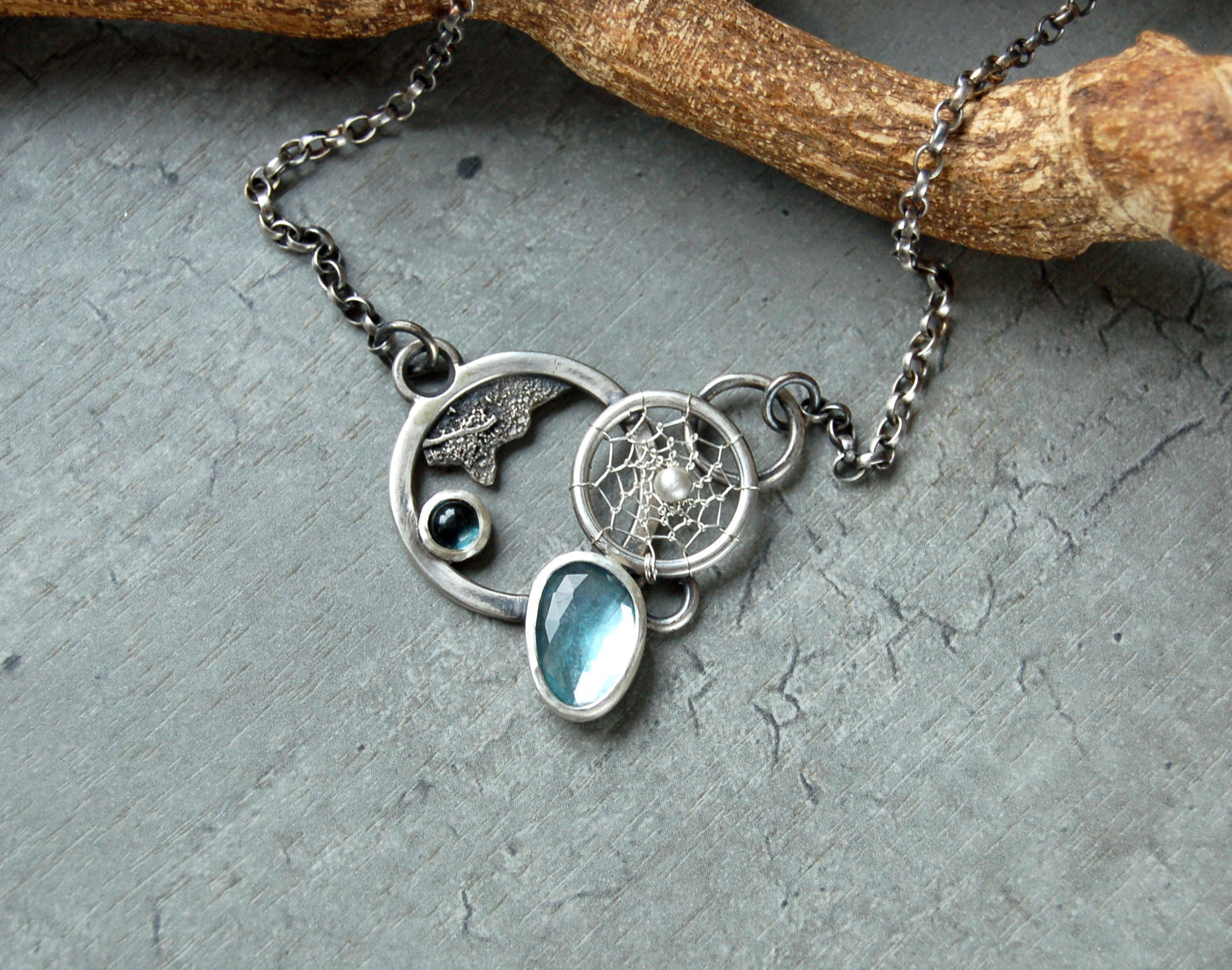 London Blue topaz gemstone necklace. Boho chic dreamcatcher pendant