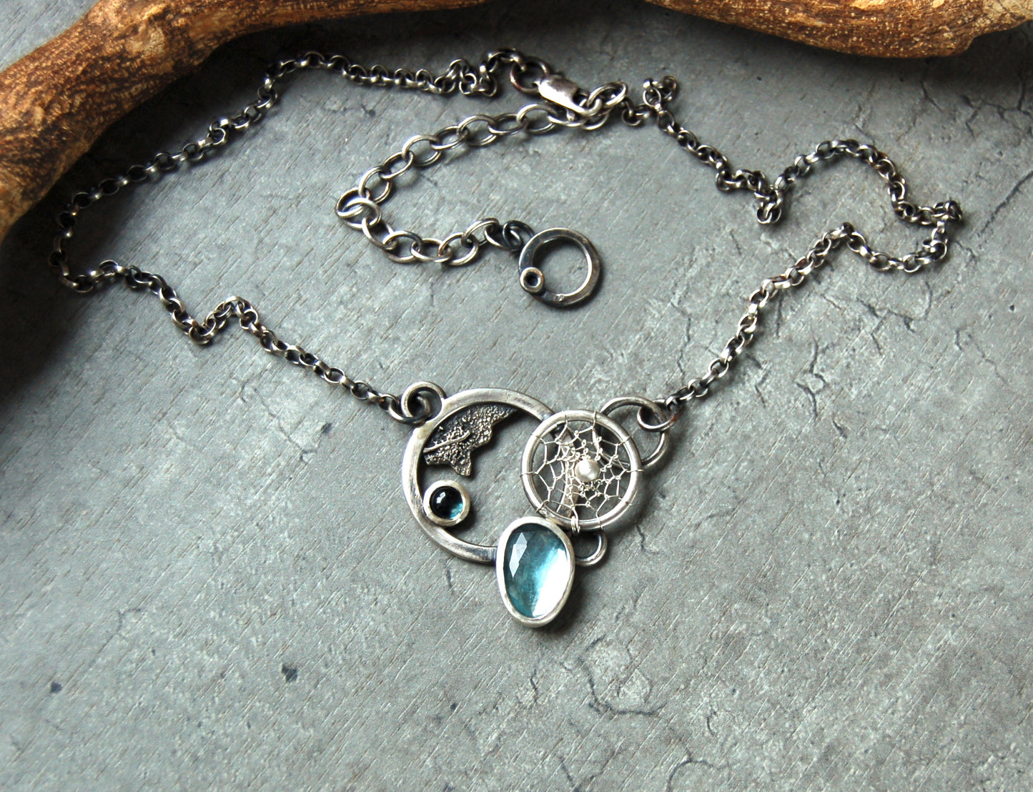 London Blue topaz gemstone necklace. Boho chic dreamcatcher pendant