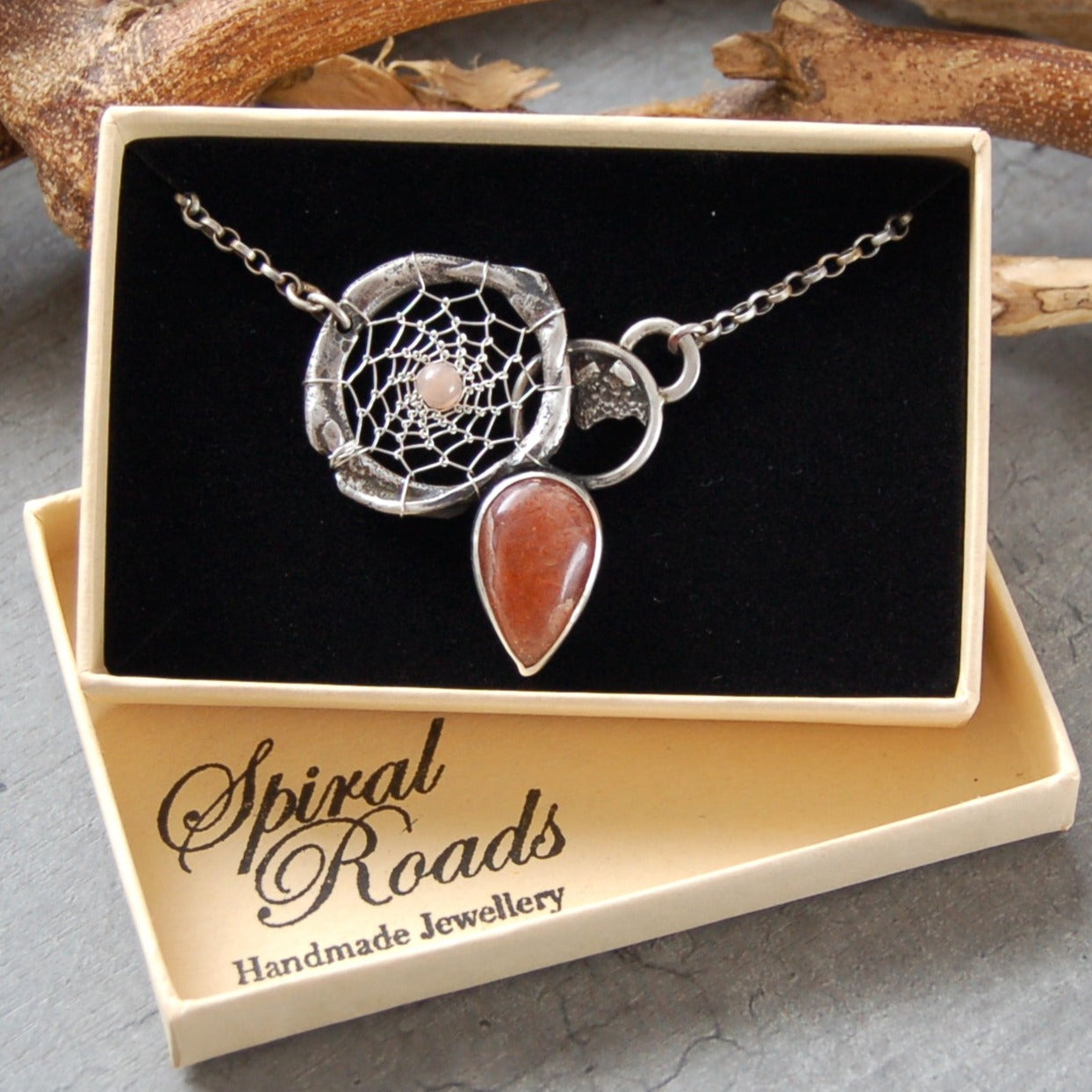 silver dream catcher necklace with sunstone gemstones and organic textures. Abstract bohemian style Pendant