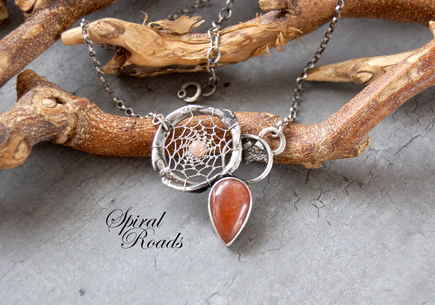 silver dream catcher necklace with sunstone gemstones and organic textures. Abstract bohemian style Pendant