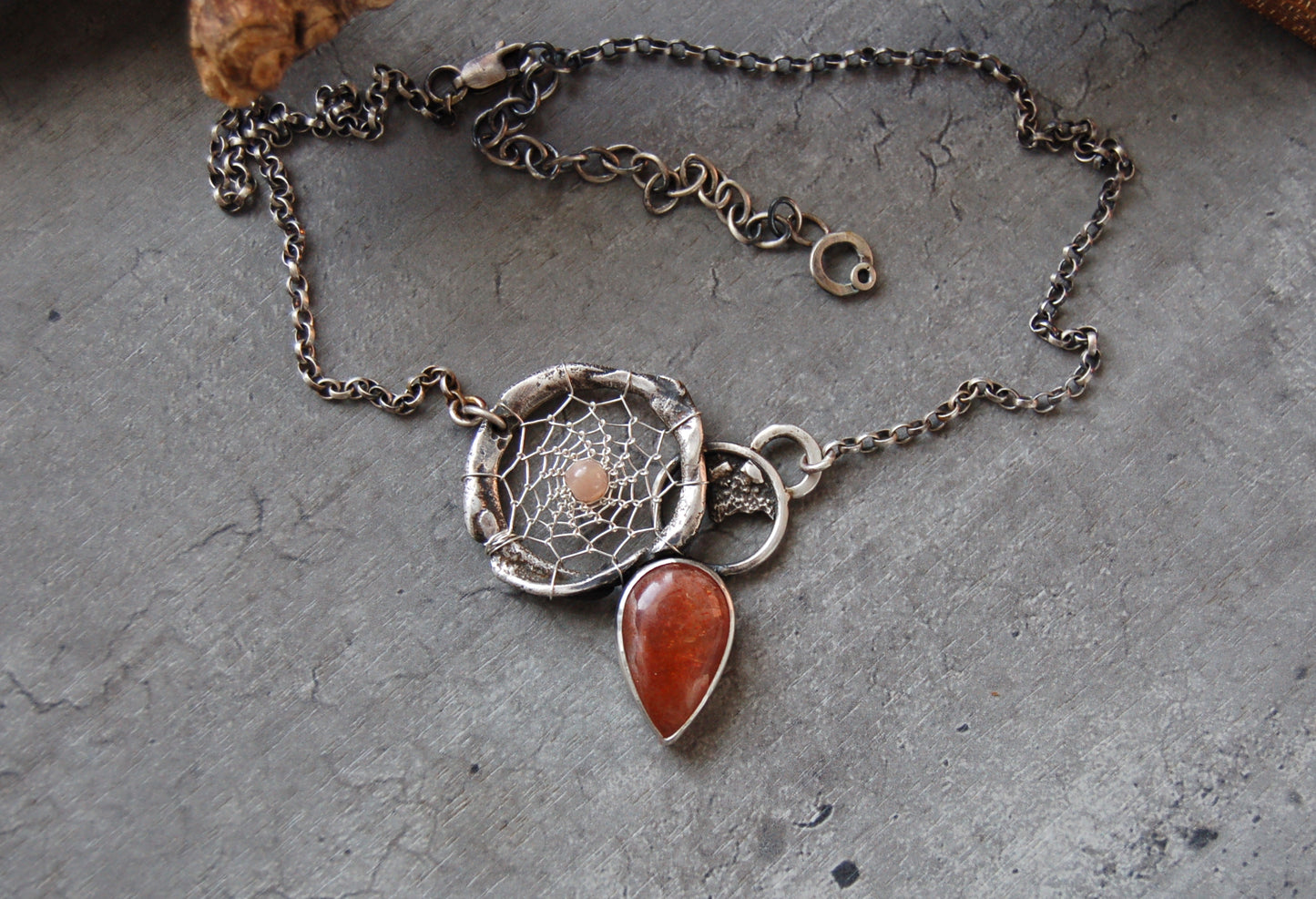 silver dream catcher necklace with sunstone gemstones and organic textures. Abstract bohemian style Pendant