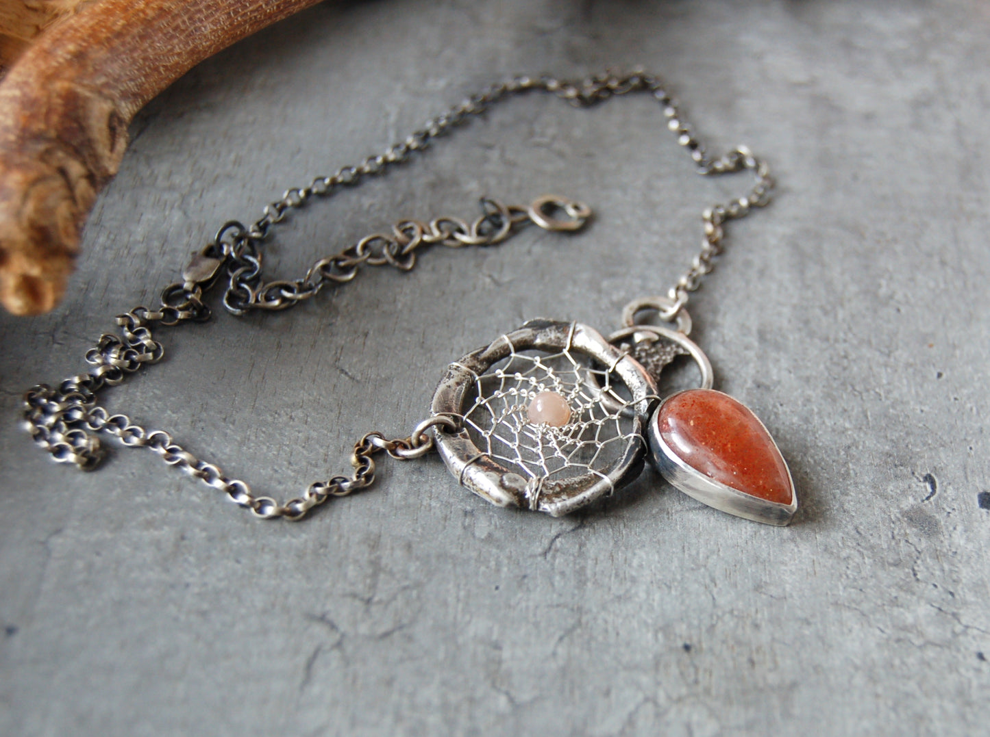 silver dream catcher necklace with sunstone gemstones and organic textures. Abstract bohemian style Pendant