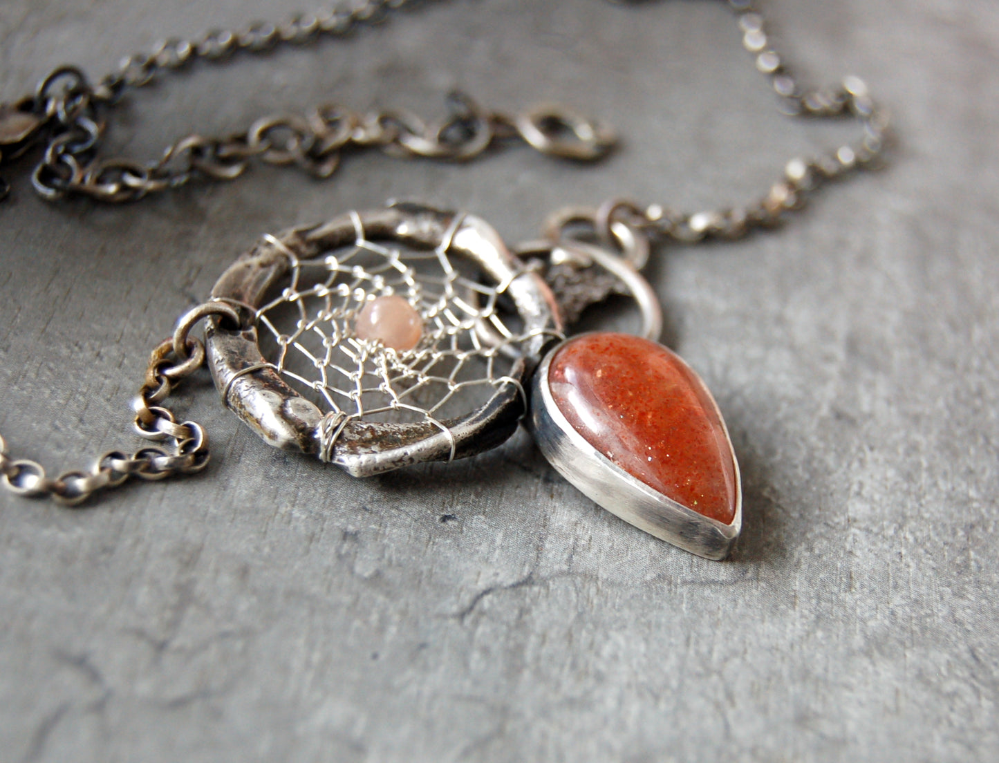 silver dream catcher necklace with sunstone gemstones and organic textures. Abstract bohemian style Pendant