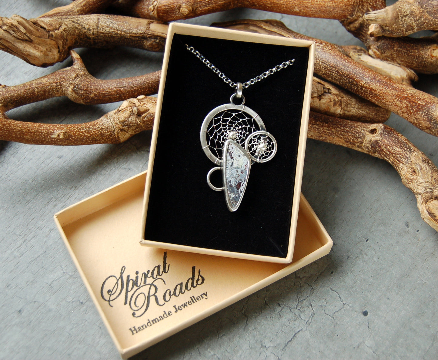 Silver dreamcatcher pendant with crazy lace agate gemstone