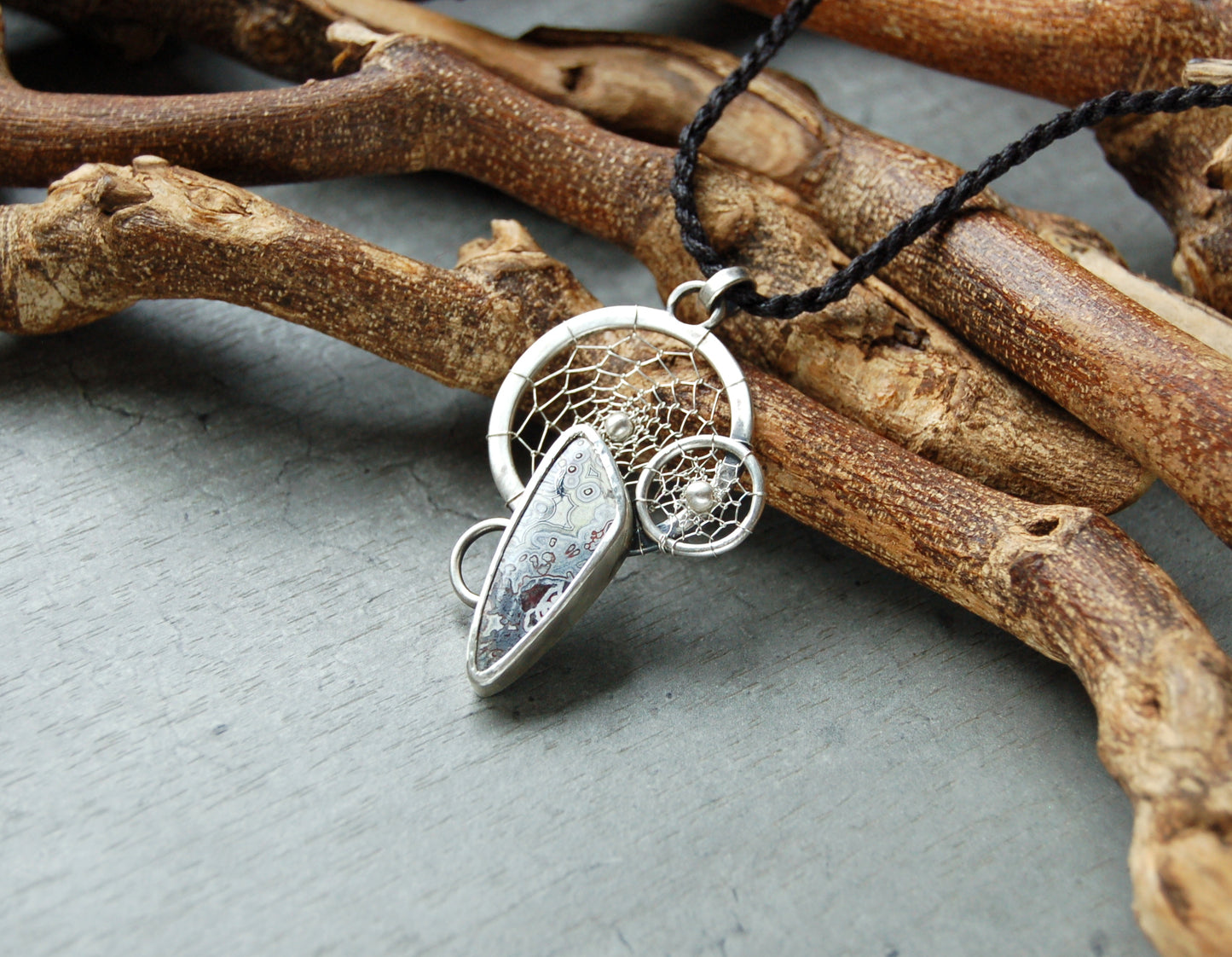 Silver dreamcatcher pendant with crazy lace agate gemstone