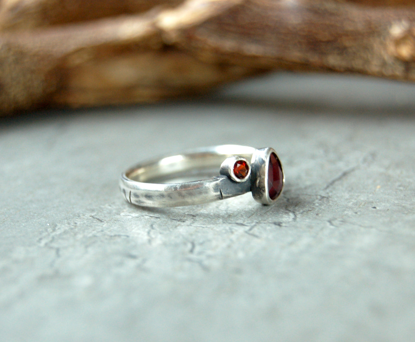 Silver stacking ring with red garnet gemstones