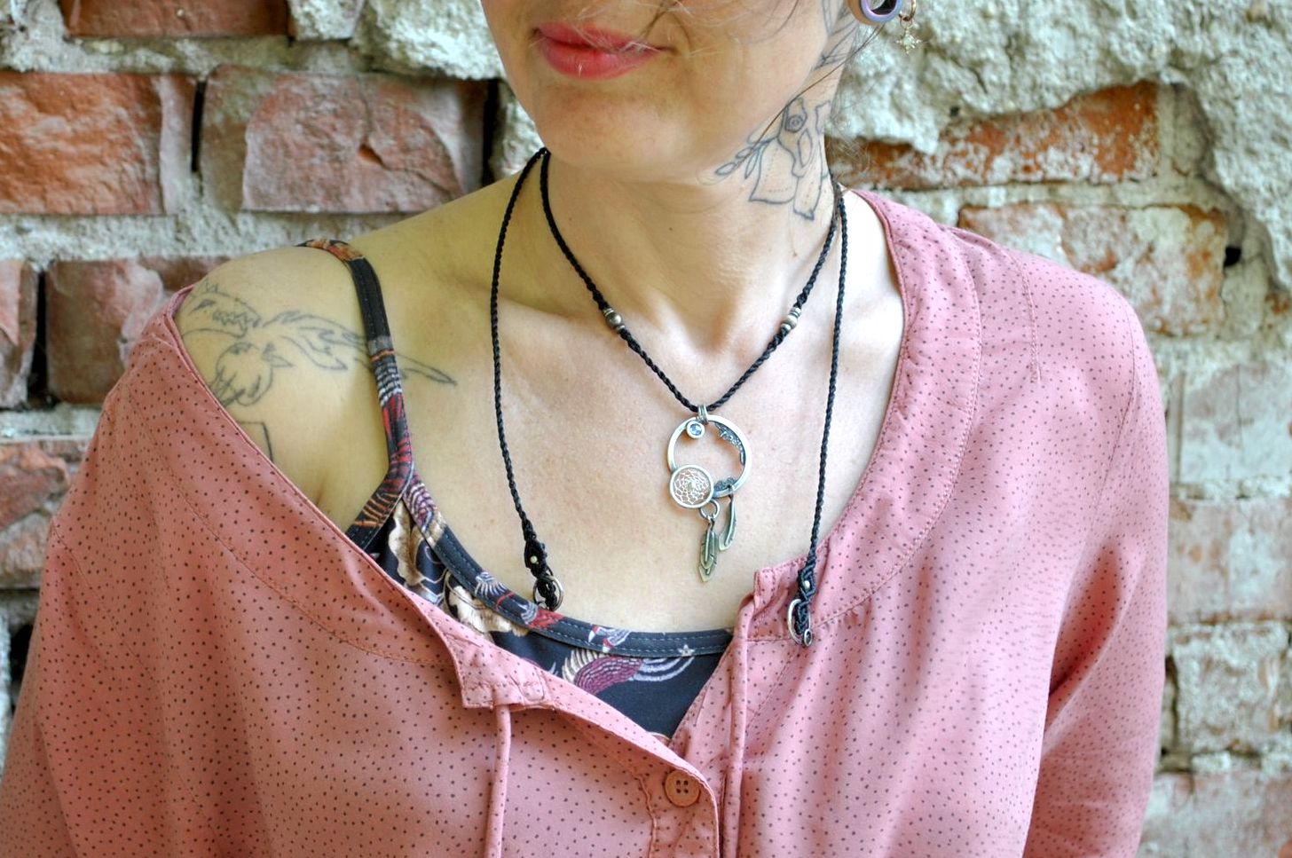 Boho girl with silver dream catcher necklace
