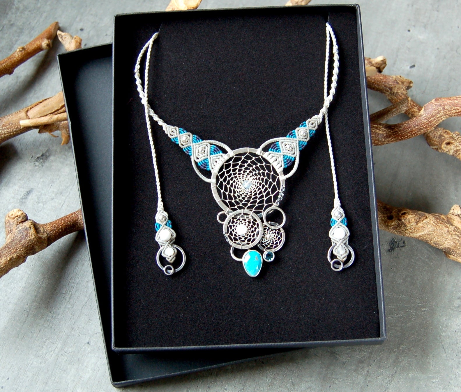 Silver Dreamcatcher statement necklace with blue gemstones